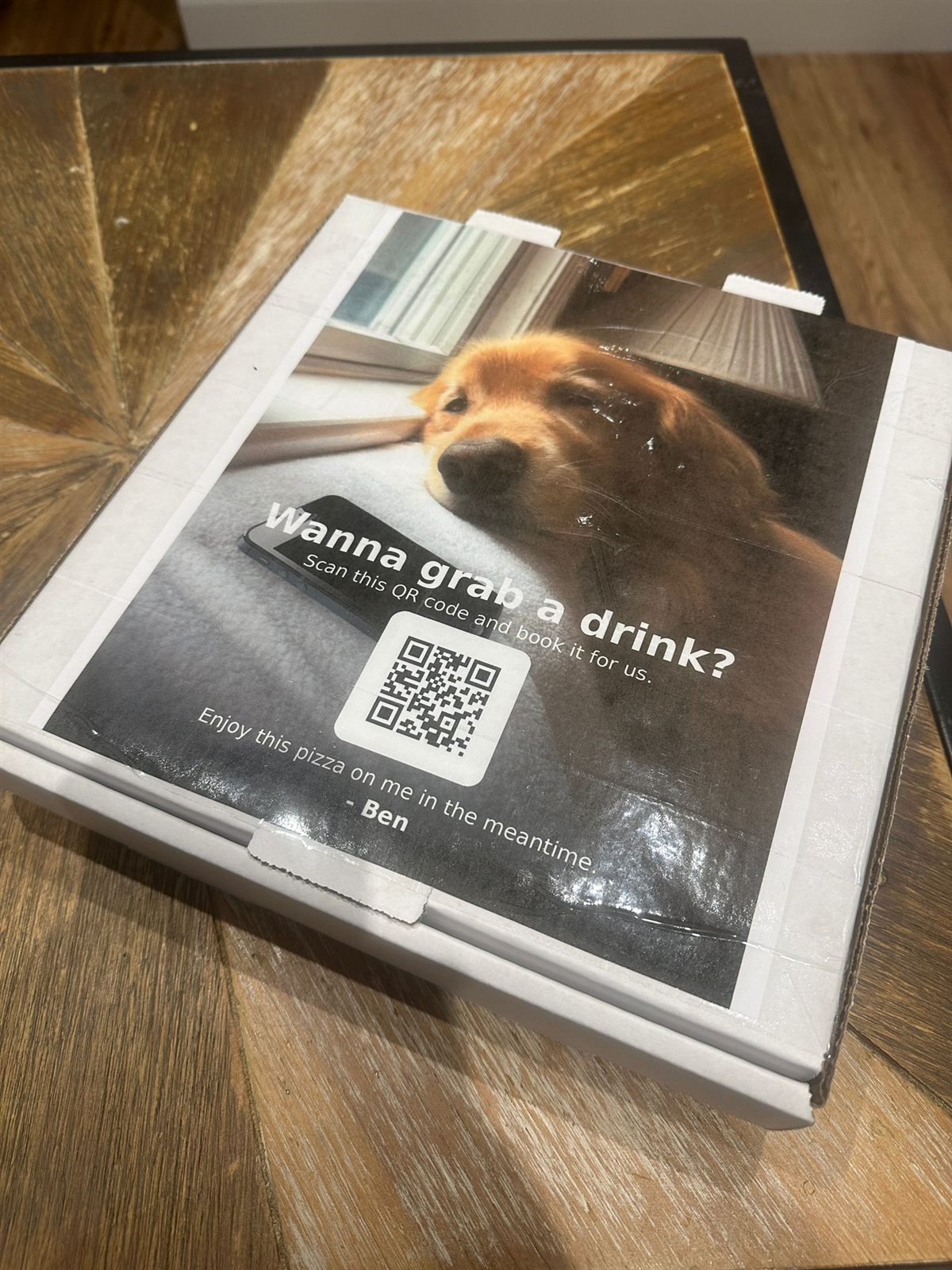 Example pizza box lid showing a custom photo and message printed on it